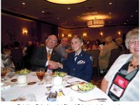D008 Brigade 2016Reunion BobMotley-Bob Van Pelt gives 1st Signal Brigade challenge coin to Color Guard member